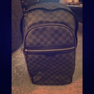 Authentic Louis Vuitton backpack -Michael